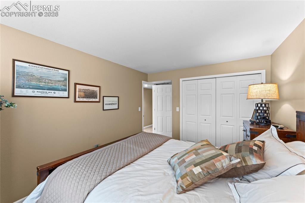 Image 37 of 48: Basement bedroom