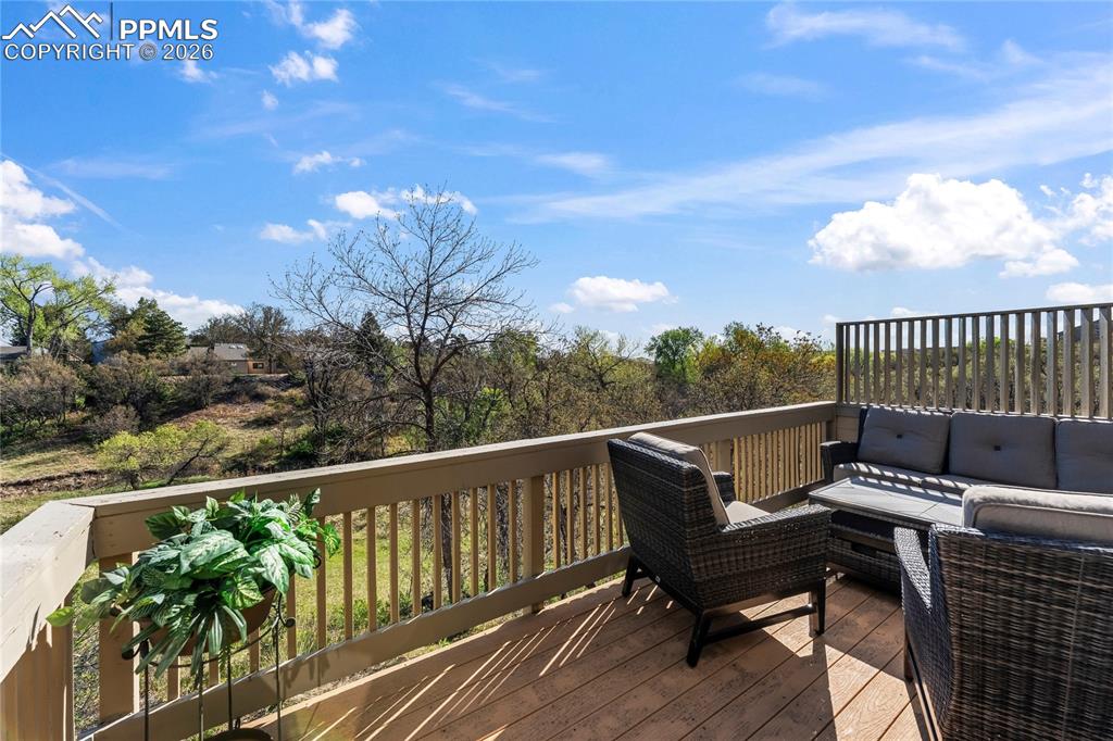 Image 41 of 48: The deck has a beautiful sweeping view to the east of the vast open space, 