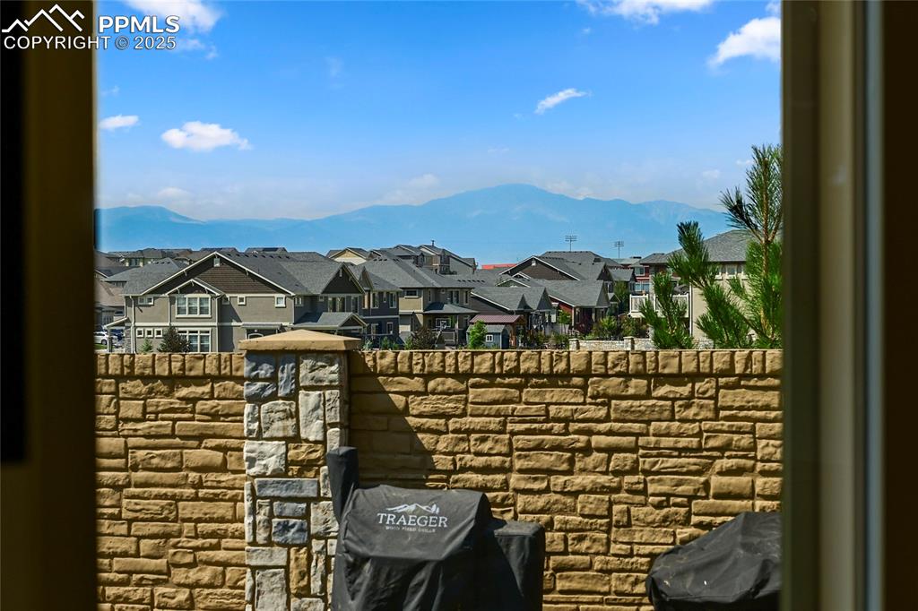 Image 28 of 28: View of mountain background with nearby suburban area