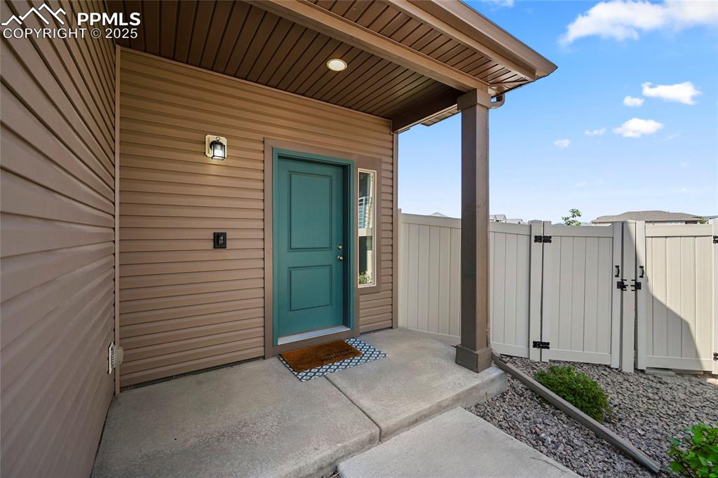 Image 3 of 28: View of exterior entry featuring a gate