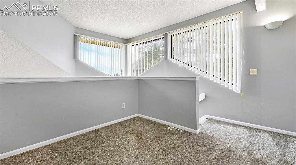 Image 17 of 30: incredible large trapezoid widows and natural light!