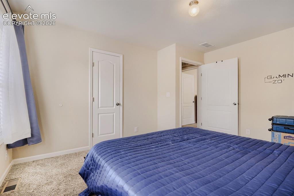Image 19 of 26: Bedroom