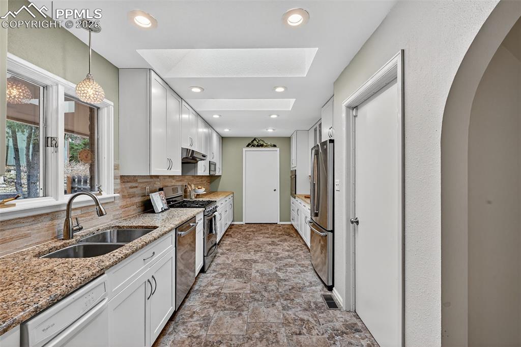 Image 21 of 50: Massive Pantry and storage