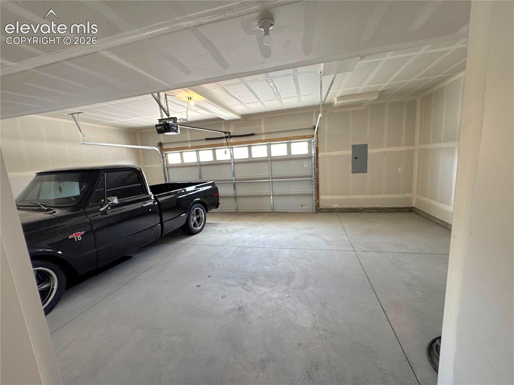 Image 23 of 26: over sized garage