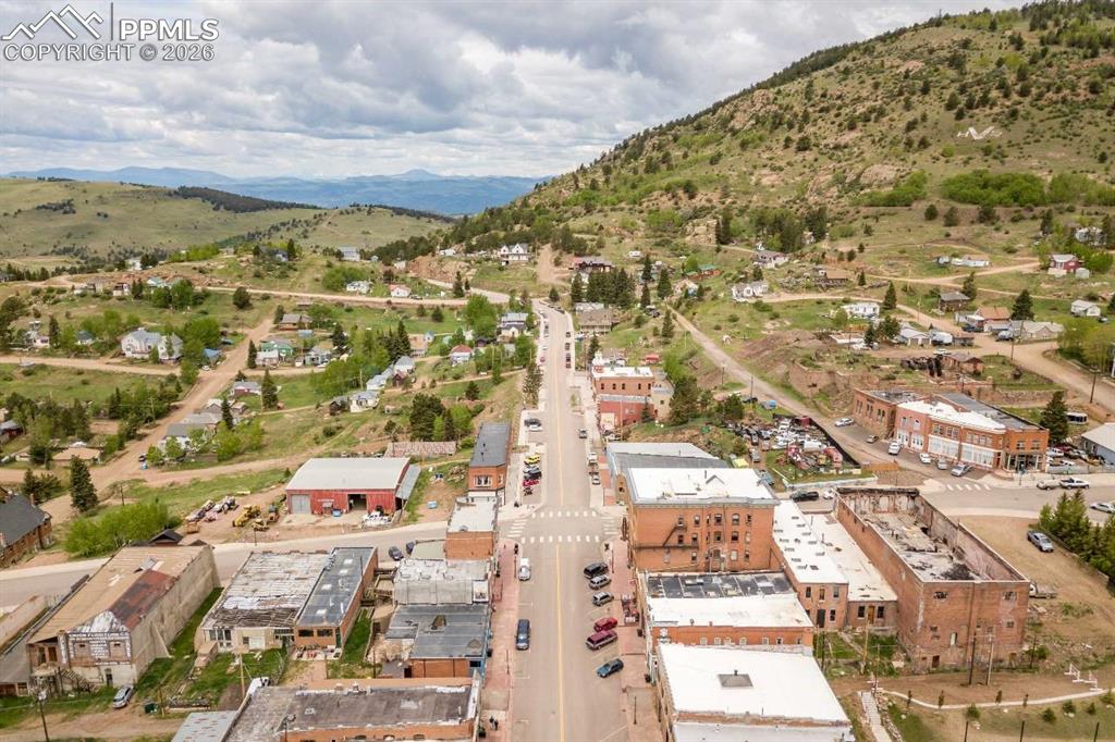 Image 32 of 36: Aerial view of a mountain backdrop