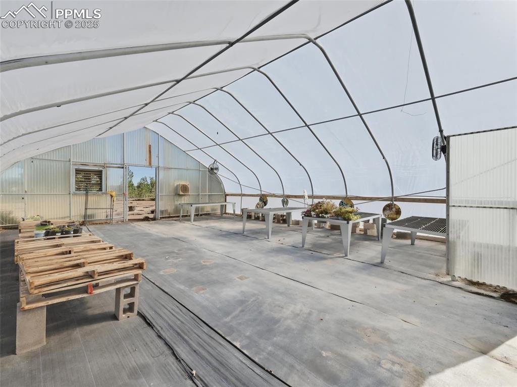 Image 8 of 12: Heated Greenhouse