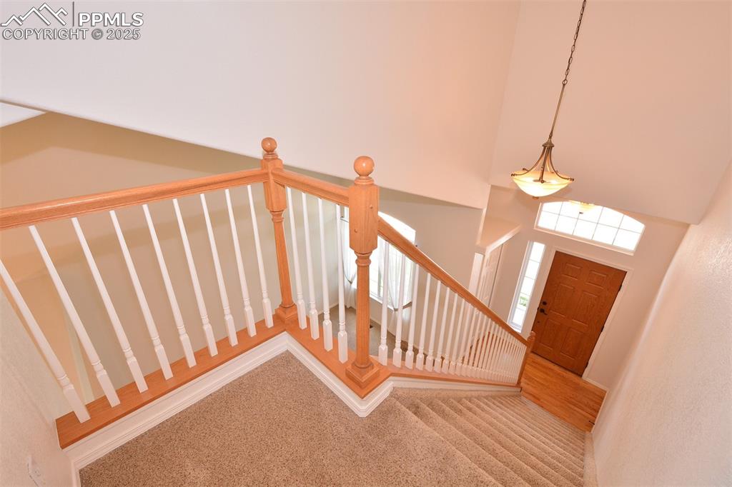 Image 24 of 43: Stairs to upper level