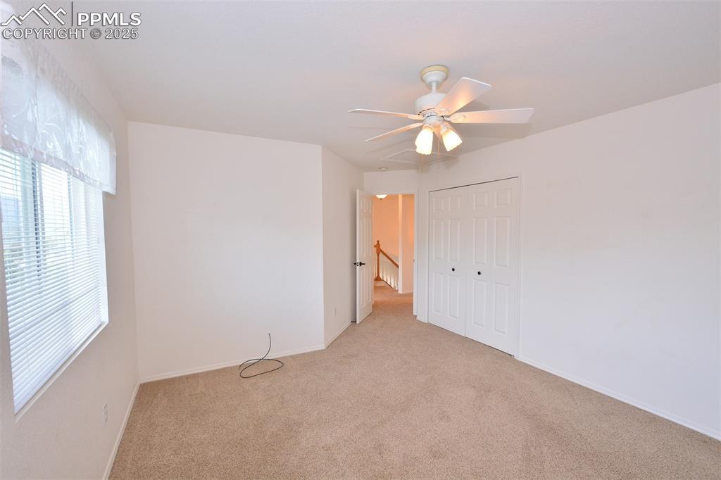 Image 37 of 43: Another view of the 3rd bedroom on upper level