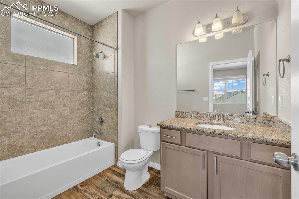 Image 32 of 44: Full bathroom featuring healthy amount of natural light, shower / bathtub c