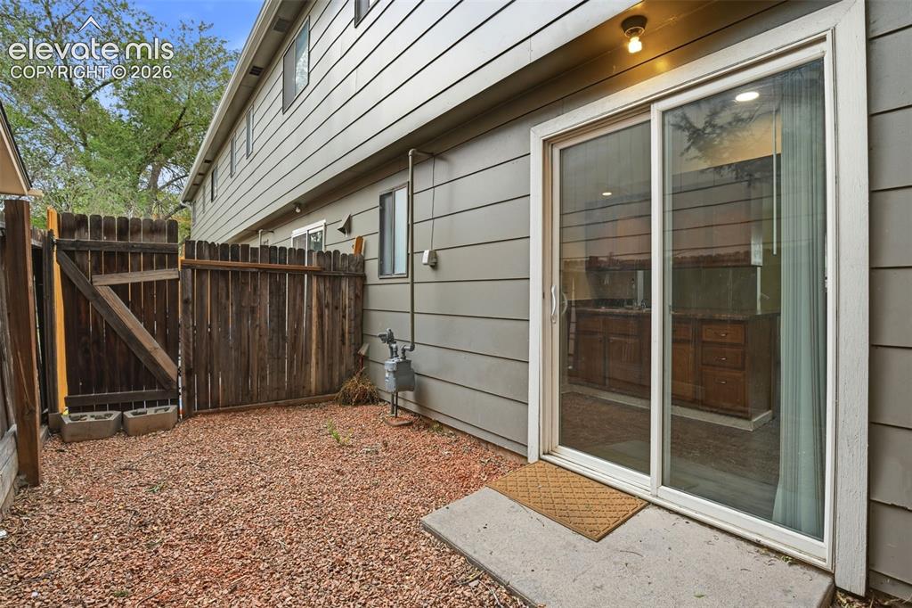 Image 17 of 31: Back Yard Directly off Kitchen