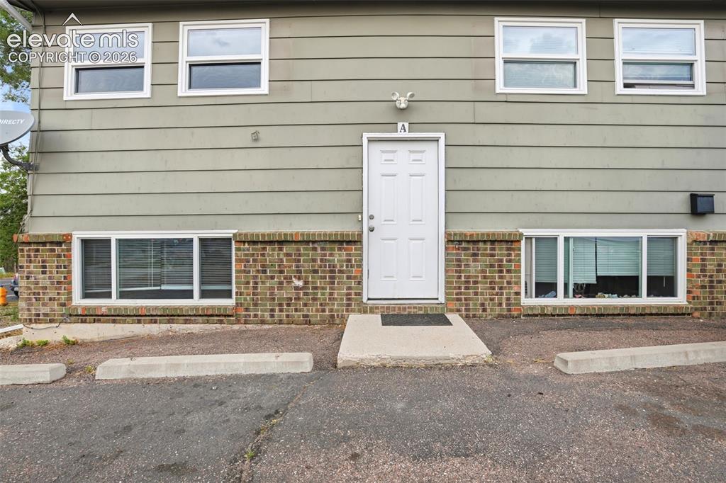 Image 4 of 31: Top Two Windows on the Left and Bottom Window are Apartment A 
