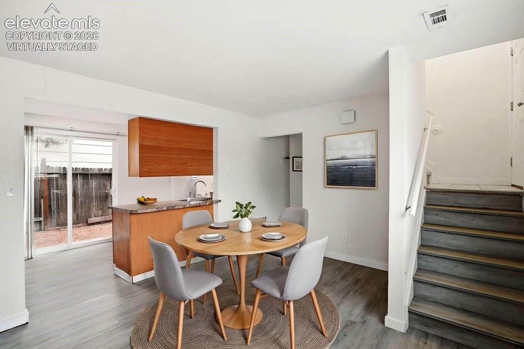 Image 9 of 31: Virtually Staged with Small Dining Table and Chairs