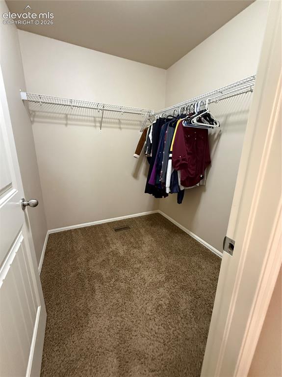 Image 20 of 34: Master bedroom, walk-in closet