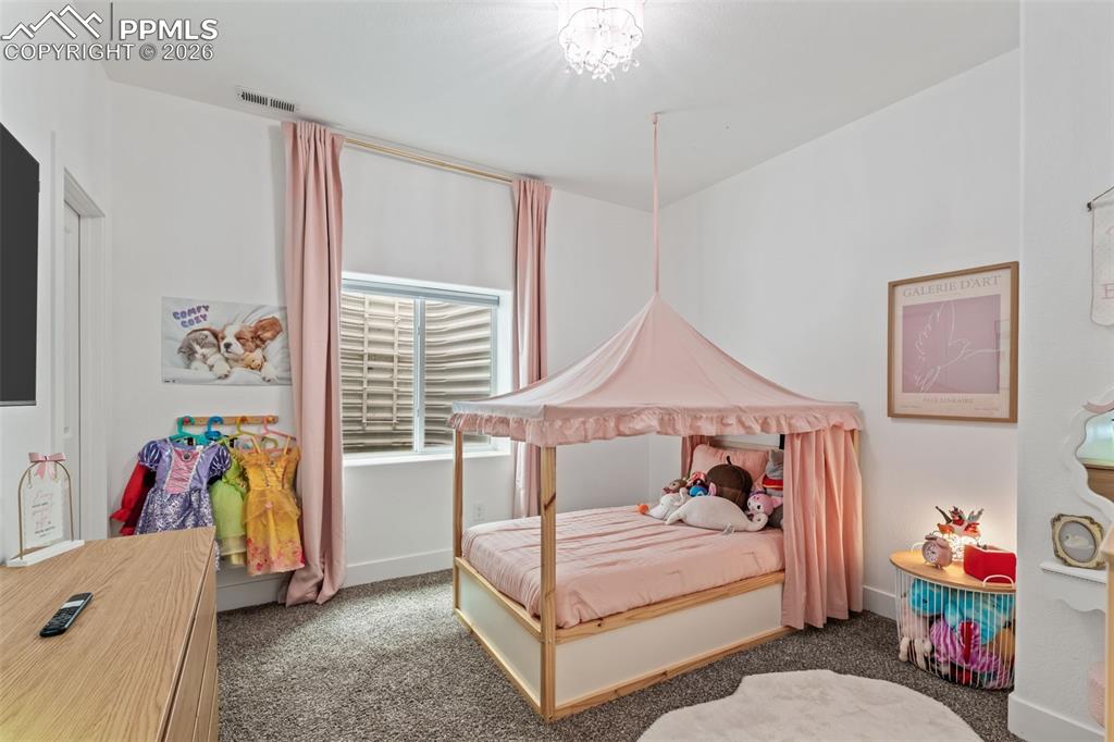 Image 40 of 50: Bedroom