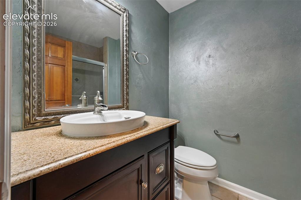Image 13 of 45: Main level full bathroom 