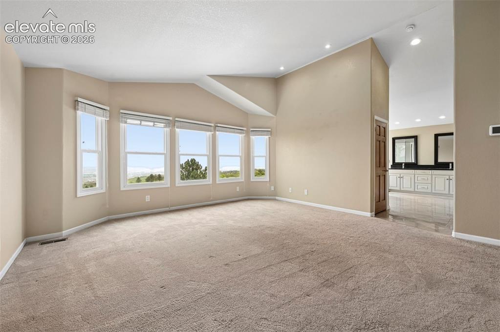 Image 19 of 45: Primary bedroom overlooking the city!  