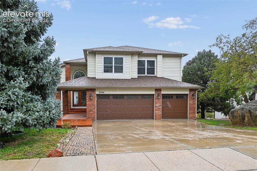 Image 44 of 45: A rainy day won’t distract from the beauty of this home! 