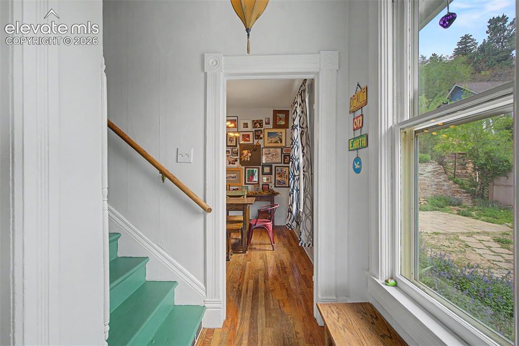 Image 12 of 50: Entry way featuring hardwood flooring