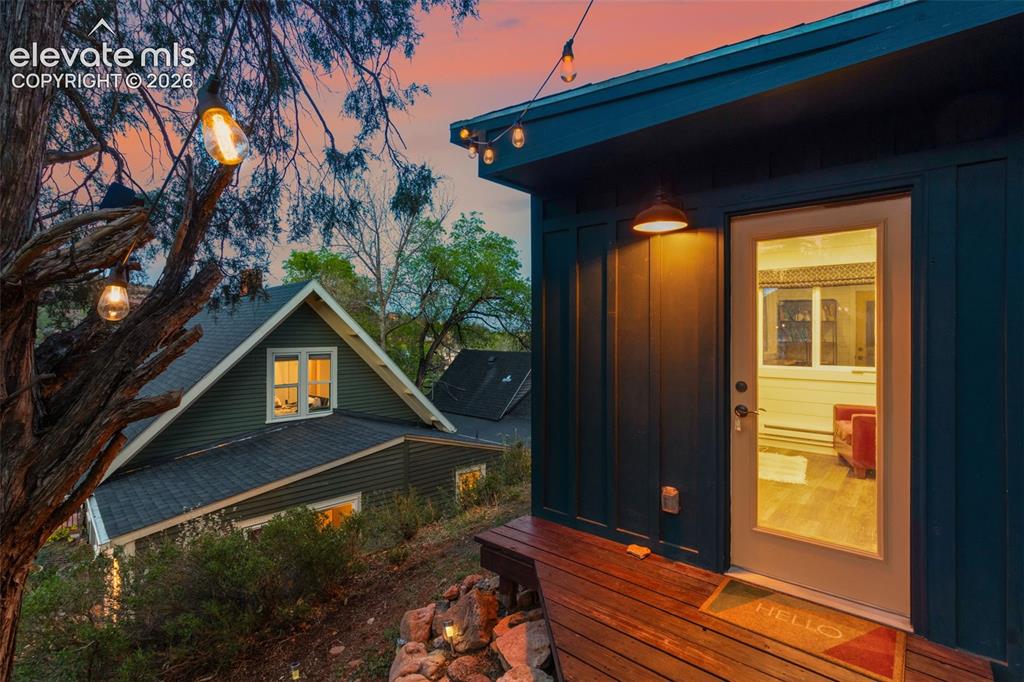 Image 4 of 50: Covered front porch with redrock views