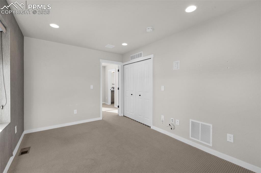 Image 18 of 38: Bedroom