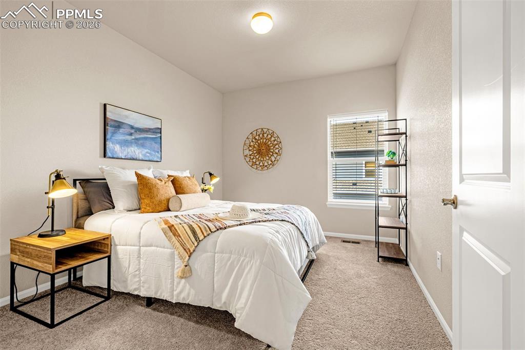 Image 22 of 37: Bedroom