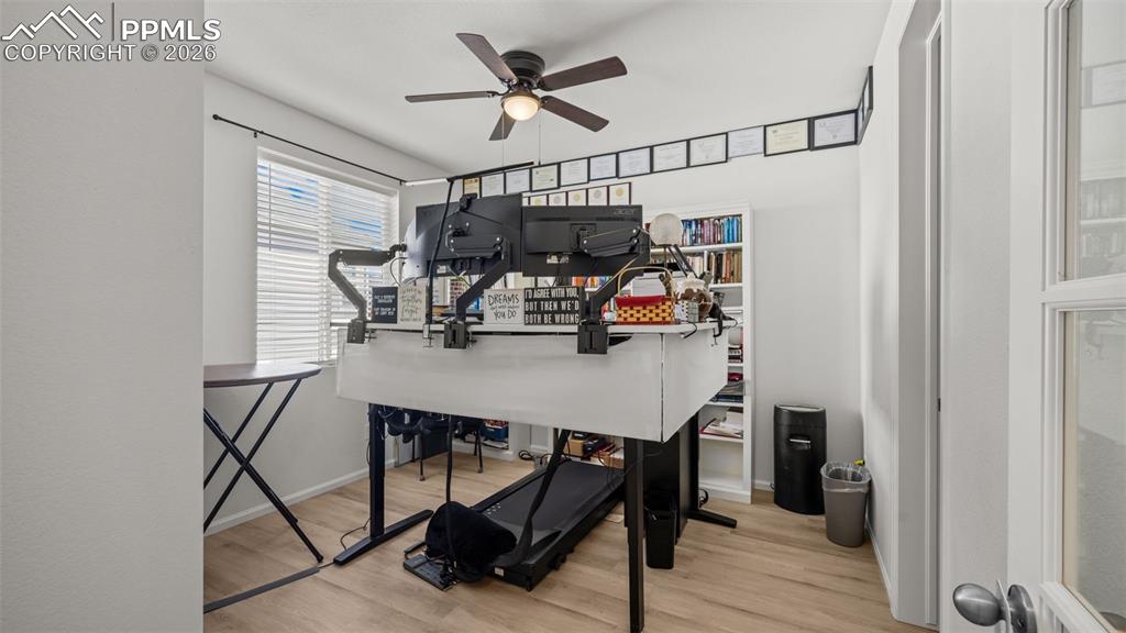 Image 15 of 46: Office with french doors.  Could also be a 6th bedroom
