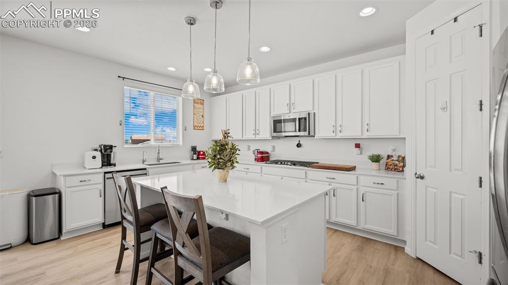 Image 4 of 46: Gourmet Kitchen with Gas Range, Double Ovens and extended countersm Quartz 