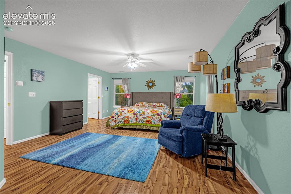 Image 17 of 50: Wood-finish flooring throughout