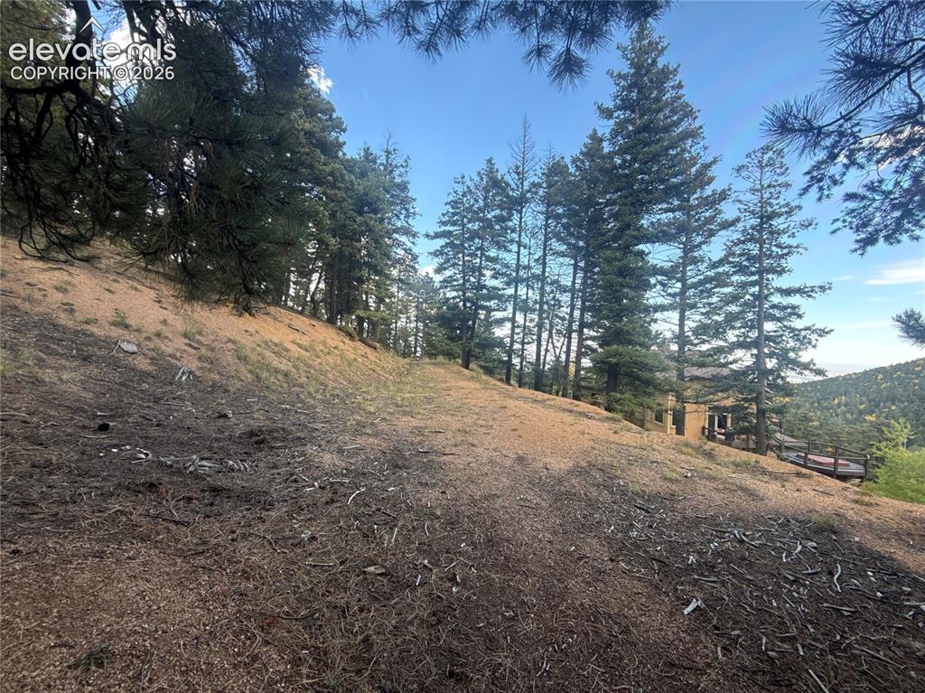 Image 11 of 21: Build site with city and mountain views