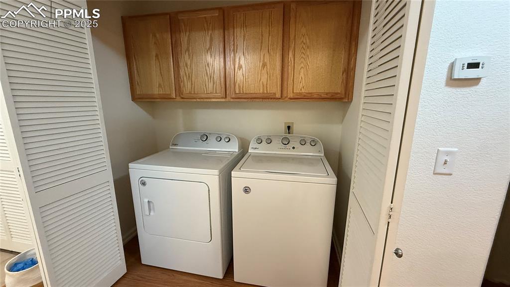 Image 19 of 26: washer and dryer stay
