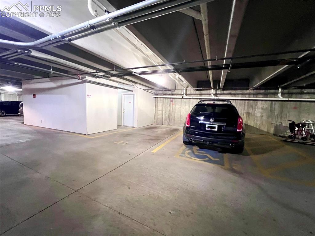 Image 26 of 26: heated garage and storage area