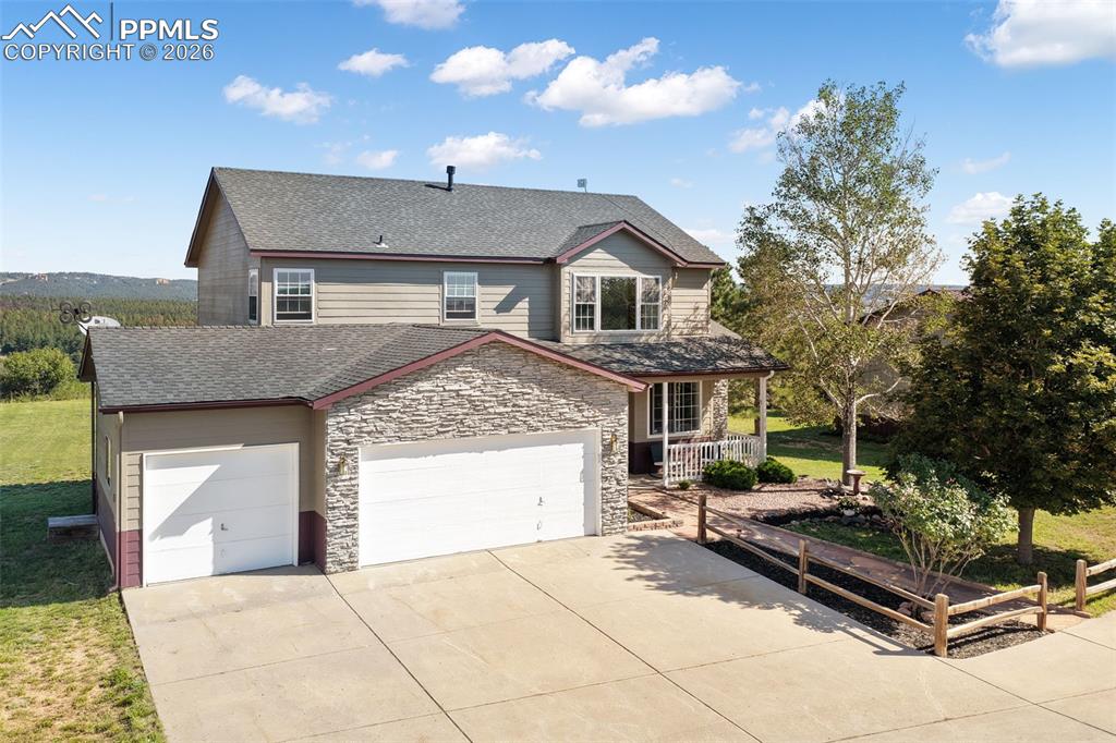 Image 7 of 50: 3 Car Attached Garage