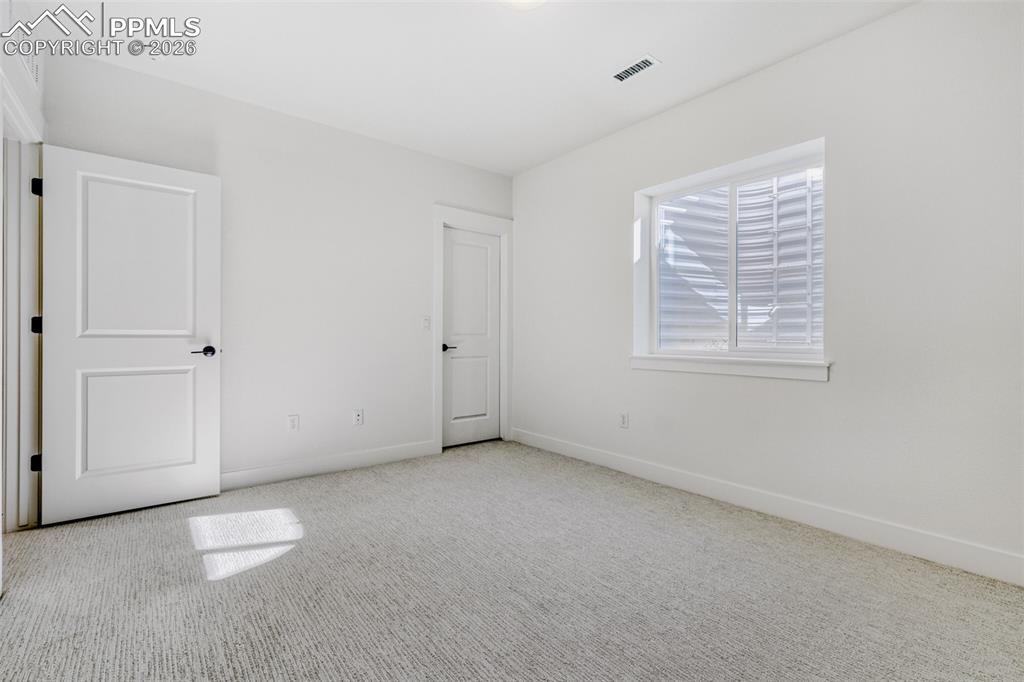 Image 18 of 28: Bedroom