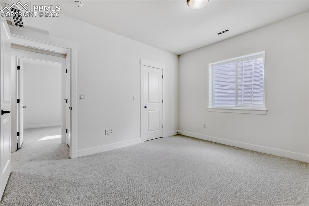 Image 19 of 28: Bedroom