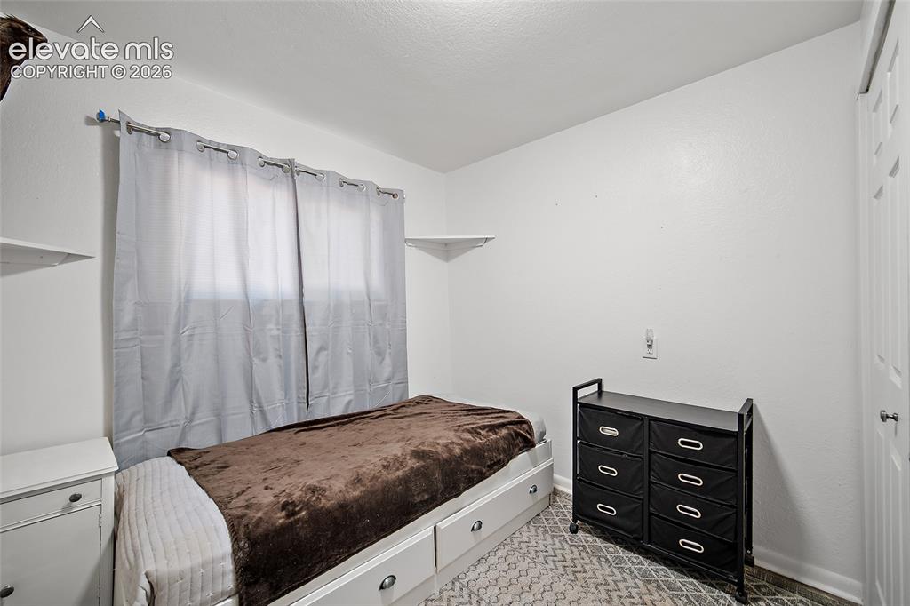 Image 18 of 28: Bedroom