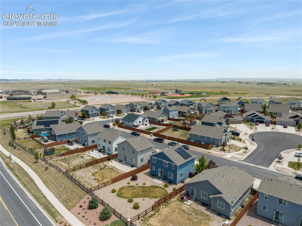 Image 43 of 50: Residential neighborhood featuring a curvilinear street layout and individu