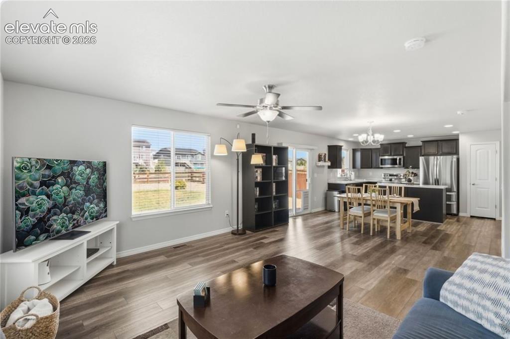 Image 6 of 50: Open concept living area with LVP flooring