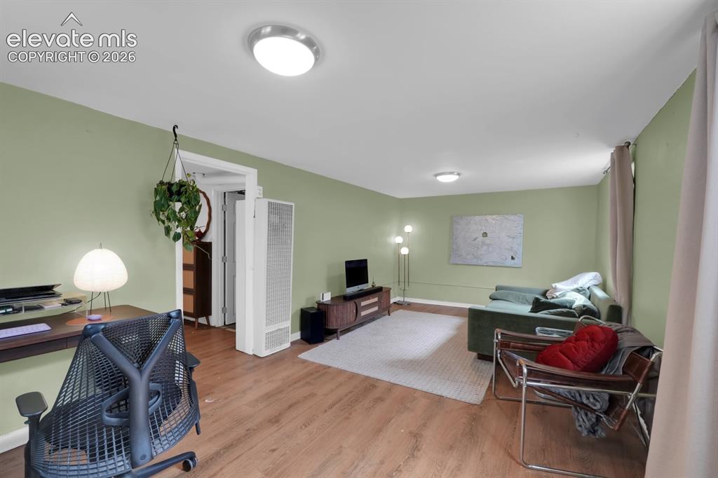 Image 12 of 23: Basement level living area