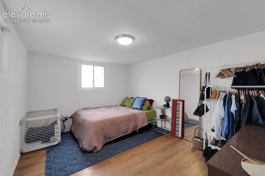 Image 15 of 23: Basement level bedroom