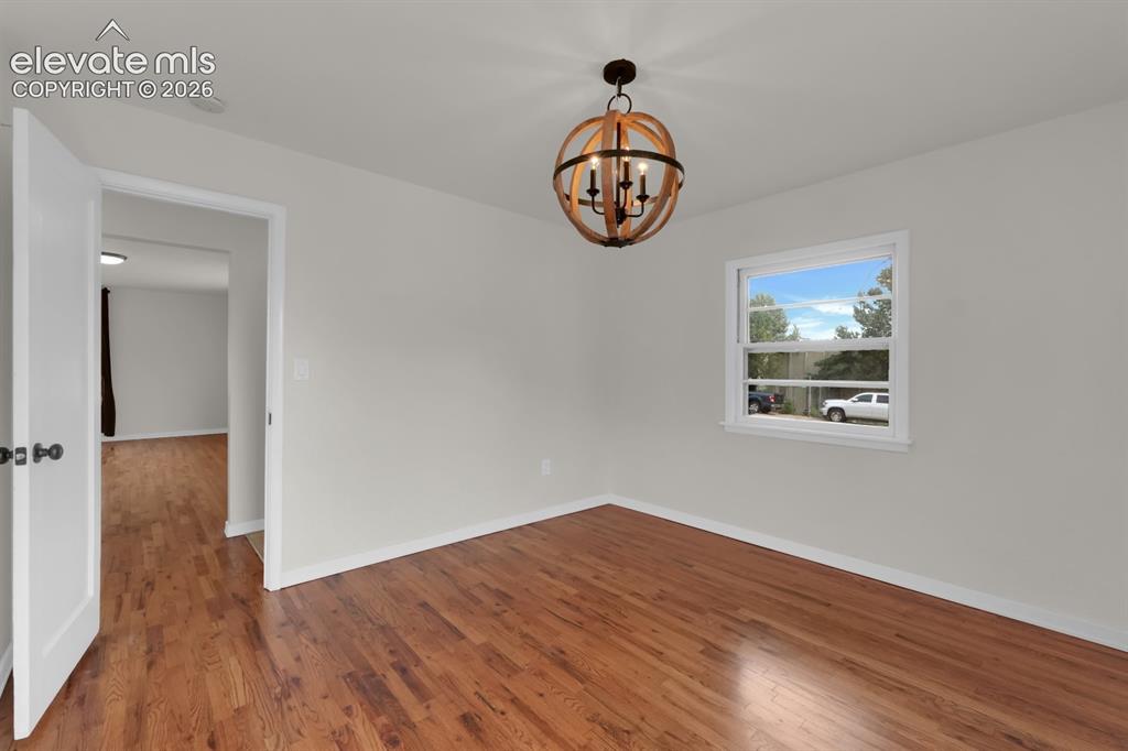 Image 5 of 23: Main-level bedroom 1