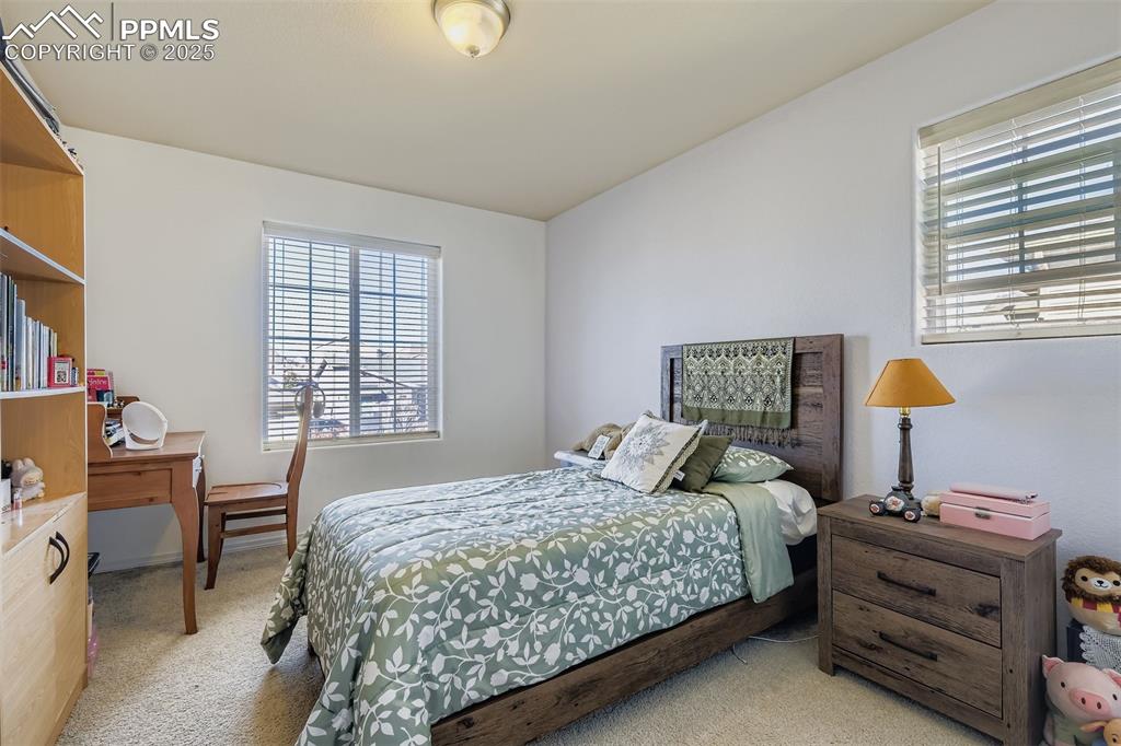 Image 17 of 32: Upper Level Bedroom