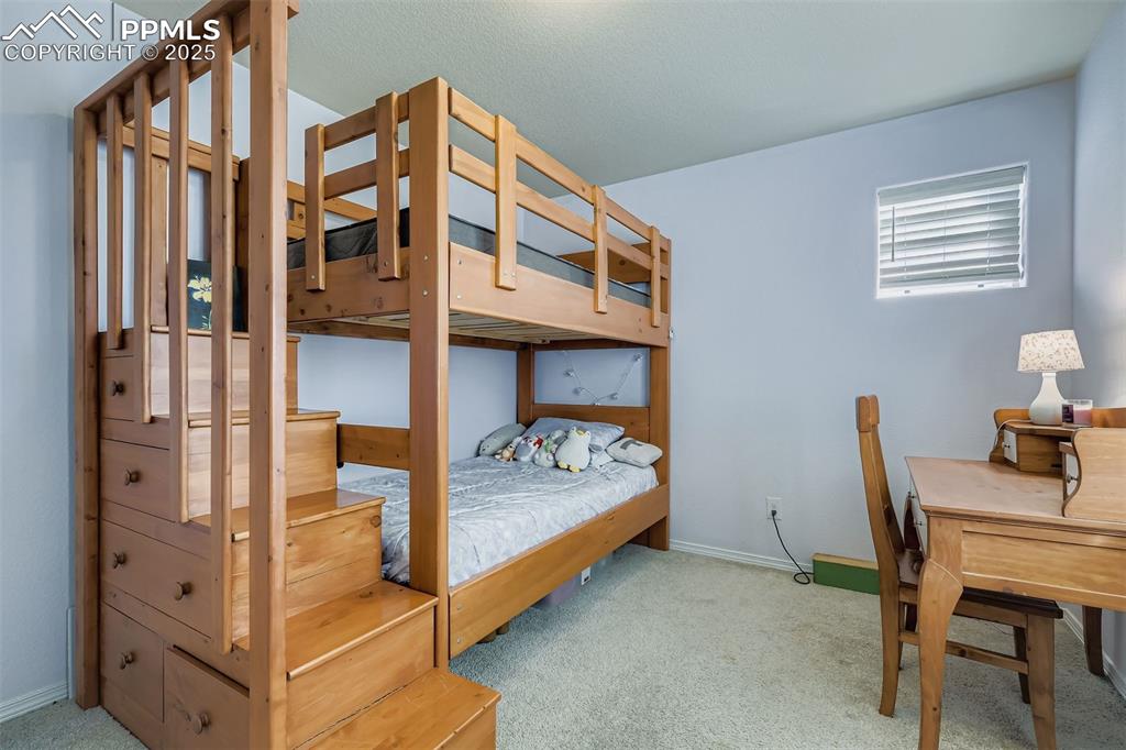 Image 19 of 32: Upper Level Bedroom