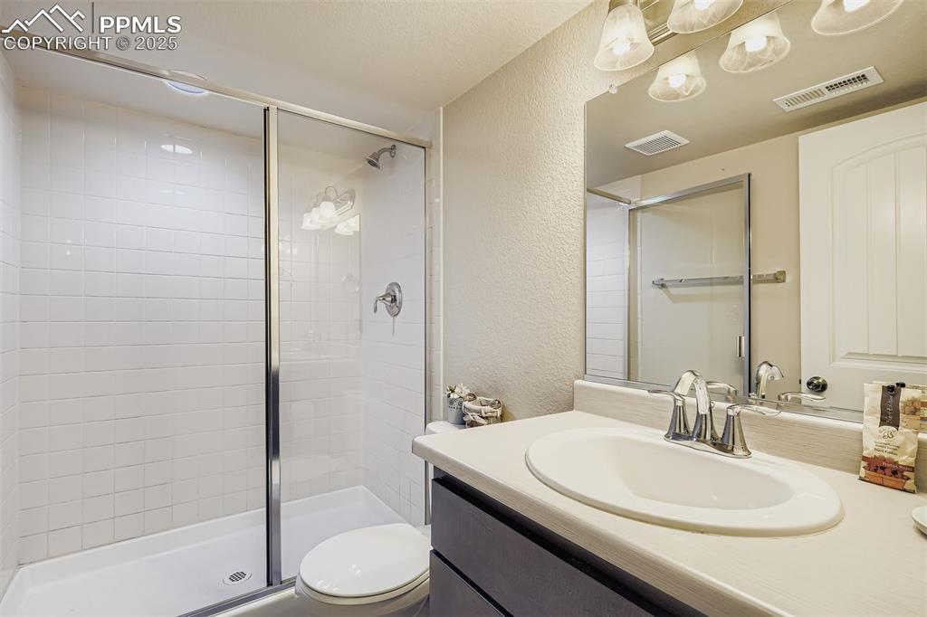 Image 23 of 32: Basement Bathroom