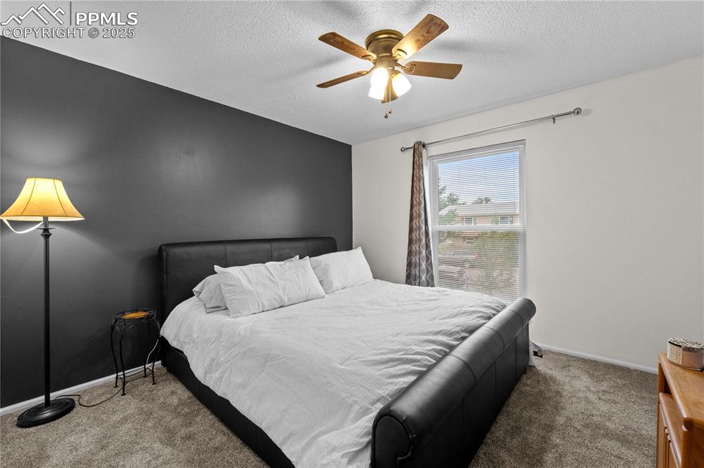 Image 8 of 21: Spacious and calm, with good closet space and soft lighting.