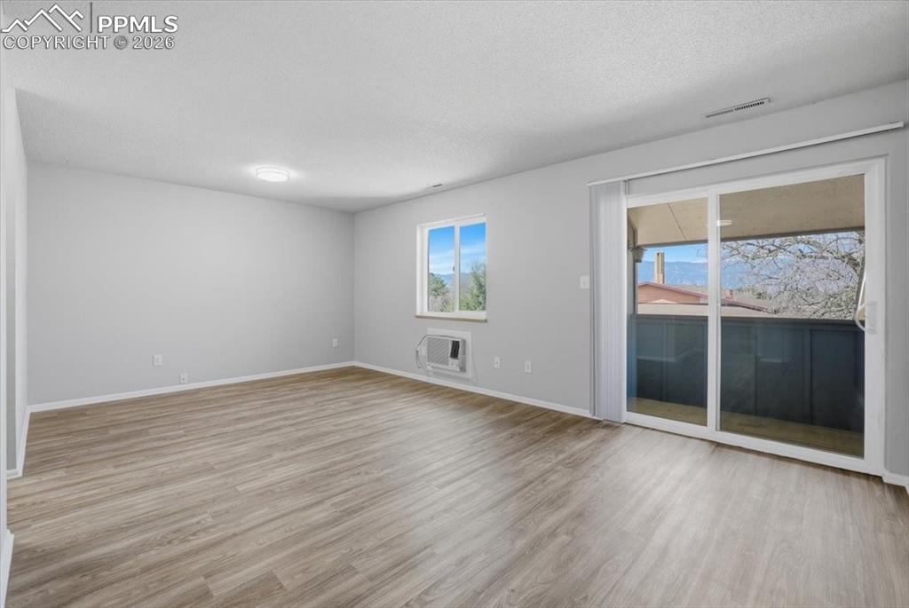 Image 2 of 34: Large living room with mountain views,
