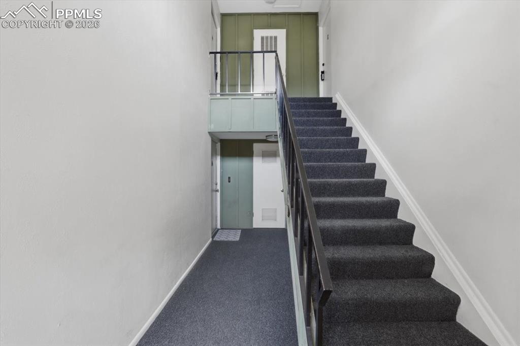 Image 8 of 34: Stairs up to home.