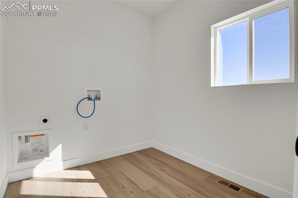 Image 20 of 29: This image shows the same model with alternate finishes. Actual home is cur