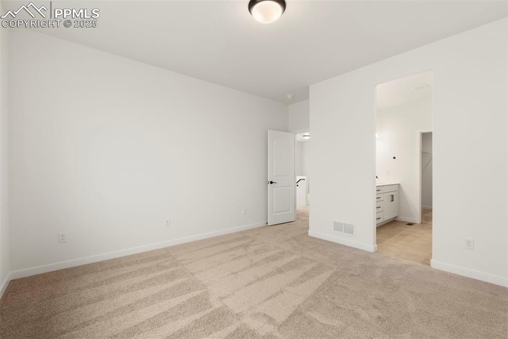 Image 33 of 48: Master Bedroom