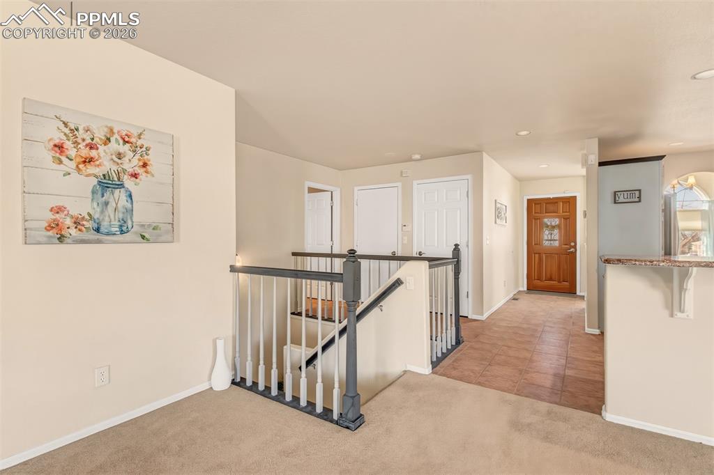 Image 12 of 30: Beautiful entry door that welcomes guests with style and charm. 