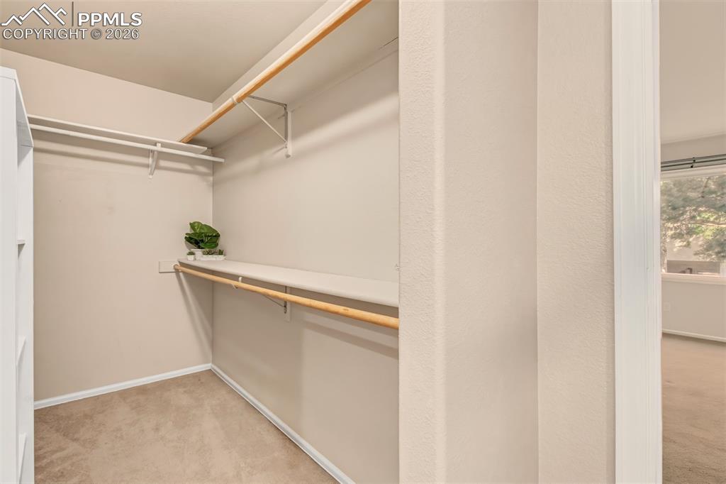 Image 18 of 30: Master bedroom closet offering ample storage space.